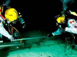 Tripulación sometida a descompresión durante la noche retornará en breve a la superficie. AFP  /
