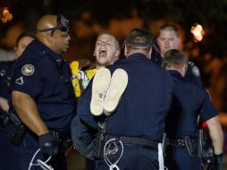 Esta madrugada fueron arrestados 52 indignados que protestaban en un parque de Atlanta. AP  /
