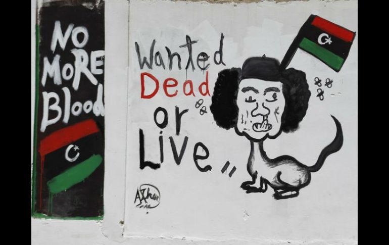 El ex mandatario libio, Muammar Gadhafi, fue capturado y muerto por rebeldes libios el pasado 20 de octubre. ARCHIVO  /