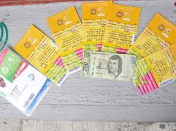 El hombre traía una credencial que lo acredita como locutor técnico de tiro deportivo. ESPECIAL  /