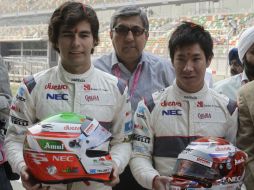 Kamui Kobayashi de Japan y el mexicano Sergio Perez (I) en el Circuito de Bubbh. AP  /