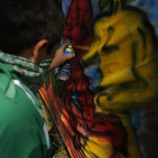 Grafiti de dos kilómetros de largo por la paz y el deporte para imponer Guinness
