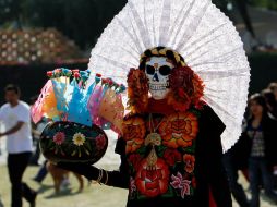 Como parte del festejo se presentarán comparsas de muertos a cargo del colectivo Cruz Blanca de Santa María Atzompa. AP  /