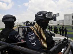 Por el delito conocido como 'halconeo', es decir, por ser vigías del crimen organizado, 21 policías fueron detenidos en Nuevo León.  /