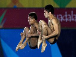 Los clavadistas Iván García y Germán Sánchez conquistaron medallas de oro en la justa deportiva. AFP  /