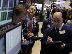 El alza se presentó luego de que la Reserva Federal dijo que mantendrá su estímulo a la economía.  /