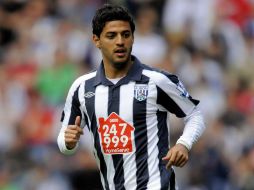 El delantero mexicano padeció un fuerte dolor en el muslo derecho. MEXSPORT  /