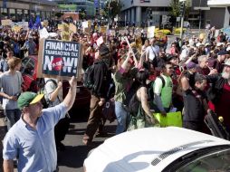 Los manifestantes ingresaron en un edificio vacío y lo declararon centro comunitario. EFE  /