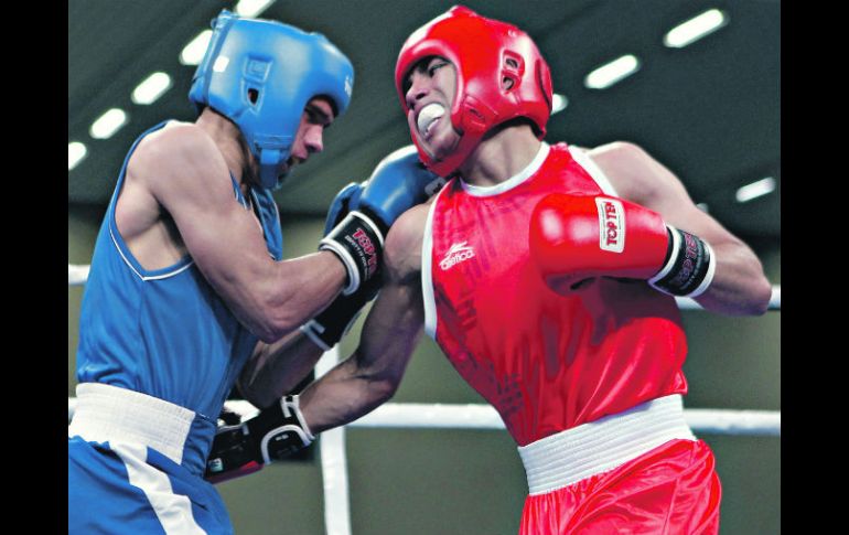 Joselito Velázquez (de rojo) fue el único boxeador mexicano que ganó medalla de oro en los Juegos Panamericanos. MEXSPORT  /