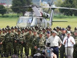 El presidente colombiano, Juan Manuel Santos, confirmó que gente dentro de las FARC ayudó a la operación que abatió a Alfonso Cano. AP  /
