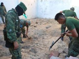 Los siete cuerpos que fueron encontrados en las fosas de Durango fueron trasladados al Semefo para ser identificados.  /