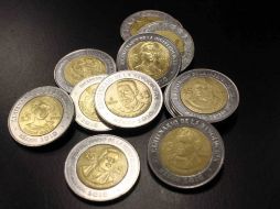 El peso mexicano comenzará a fortalecerse una vez pasada la volatilidad en los mercados. ARCHIVO  /