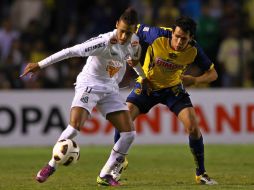 Neymar Da Silva del Santos y Patricio Trevino del América durante el juego de Copa Libertadores 2011. MEXSPORT  /
