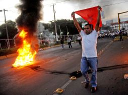 La Policía informpo que los muertos son son un activista del Frente Sandinista y tres opositores de Ortega. AFP  /