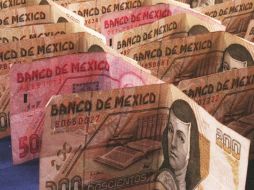 Este jueves, la moneda mexicana se apreció un 0. 80% respecto a su cotización de ayer. ARCHIVO  /