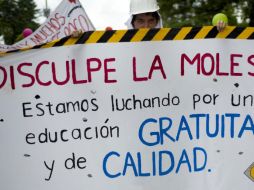 En la marcha de hoy, acudieron cerca de 20 mil estudiantes universitarios que exigen la no privatización de la enseñanza. AFP  /