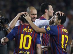 Josep Guardiola (C) Lionel Messi (I), y Pedro Rodriguez (D) celebran durante la pasada edición de la Súpercopa.  /