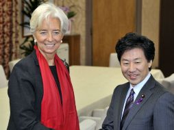 En su visita, Christine Lagarde se reunió con el ministro japonés de Finanzas, Jun Azumi. AFP  /