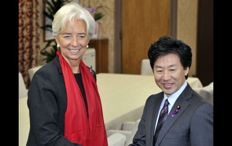 En su visita, Christine Lagarde se reunió con el ministro japonés de Finanzas, Jun Azumi. AFP  /