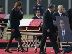 Las víctimas del accidente recibieron un homenaje en el Campo Marte. AP  /