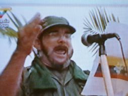 Imagen de Rodrigo Londoño, 'Timochenko', leyendo declaración en una locación desconocida en Colombia. AP  /