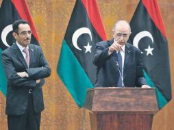 El primer ministro libio, Abdurrahim El-Keib (der.), afirma que con el nuevo régimen todo el país será representado. AFP  /