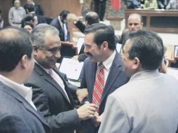 Los diputados Raúl Vargas, del PRD; Jesús Casillas, del PRI, y Roberto Marrufo, coordinador de los priistas, en una sesión del pleno.  /