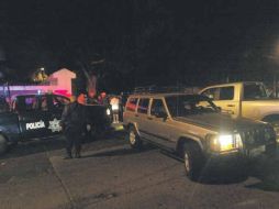 Tras el atentado, policías de Guadalajara acudieron al lugar de los hechos en la Colonia Jardines del Country.  /