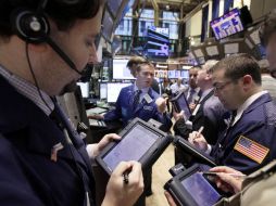 En wall Street los inversores se vieron obligados a vender desde el primer minuto de la jornada. AP  /