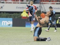 El defensa Manuel López Mondragón festeja con júbilo el pase a semifinales, las primeras para Querétaro en 61 años de existencia.  /