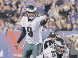 Vince Young (9), le cambió la cara al equipo y los guió a la victoria sobre los Gigantes de Nueva York. GETTY IMAGES SPORT  /