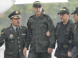 El sargento Erazo de 48 años (derecha), cayó en manos del grupo guerrillero en 1999 en Curillo, población de Caquetá.  /