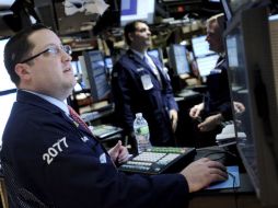 El Dow Jones subió 32.62 puntos; terminó la jornada en 11.555,63 unidades. EFE  /