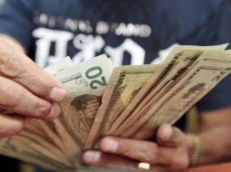 Fijó su mayor cotización a la venta en 13.90 pesos y la mínima de compra en 13.05 pesos, en instituciones bancarias del país.  /