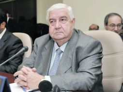 El ministro de Relaciones Exteriores sirio, Walid Muallem, atiende una reunión de la Organización de la Cooperación Islámica. AFP  /