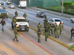 El 24 de noviembre fueron encontradas 26 personas ejecutadas cerca de Los Arcos del Milenio.  ARCHIVO  /