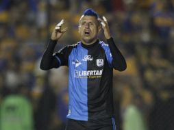 Adolfo Bautista lamenta una falle durante el partido ante Tigres. AP  /