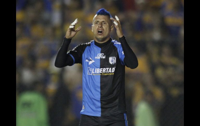 Adolfo Bautista lamenta una falle durante el partido ante Tigres. AP  /