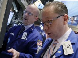 Más de tres acciones subieron por cada título que bajó en la Bolsa de Valores de Nueva York. AP  /