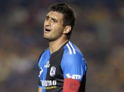 Carlos Bueno lamenta el autogol que al final fue la diferencia y la eliminación del Querétaro. MEXSPORT  /