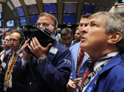 El Dow Jones rebajó sus ganancias, aunque tan solo seis de sus componentes cerraron en negativo. ARCHIVO  /