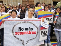 Esta mañana, miles de ciudadanos realizaron una manifestación como rechazo al asesinato de secuestrados. REUTERS  /