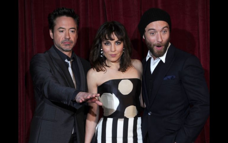 Robert Downey Jr, Noomi Rapace y Jude Law. AFP  /