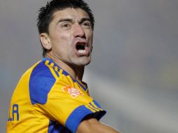 Héctor Mancilla celebra su anotación clave en el partido de hoy. AP  /