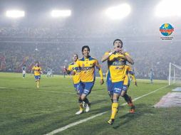Héctor Mancilla (der.) celebra su gol. REUTERS  /