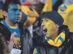 Aspecto de aficionados de Tigres durante el partido en el Estadio Universitario. AFP  /