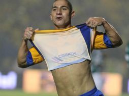 El brasileño mostró su talento y fue clave en el triunfo del Tigres. AP  /