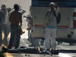 El enfrentamiento entre estudiantes de la Escuela Normal Rural Raúl Isidro Burgos, de Ayotzinapa, y Policía dejó dos muertos. AP  /