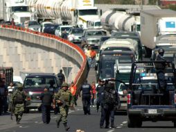 El gobierno de Guerrero lamentó el enfrentamiento entre policías y estudiantes en una autopista, en el que murieron dos personas. AP  /