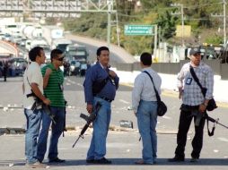 Los elementos detenidos fueron identificados en grabaciones de video de la confrontación. NOTIMEX  /